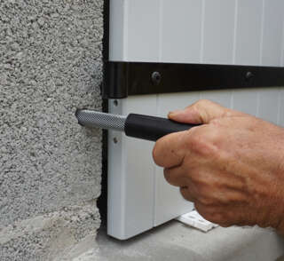 OUTIL DE POSE FILTRE MÉTALLIQUE en situation